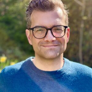 A portrait photo of Benjamin Fuchs