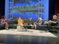 A panel onstage